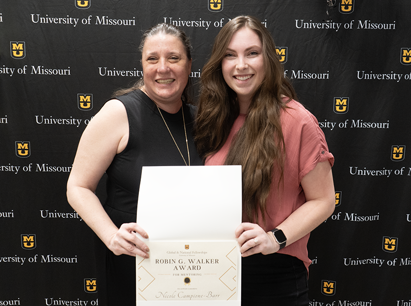 The MU Excels event featured a handful of awards, including three for faculty mentors. Pictured is Nicole Campione-Barr (left), who earned the Robin G. Walker Award.